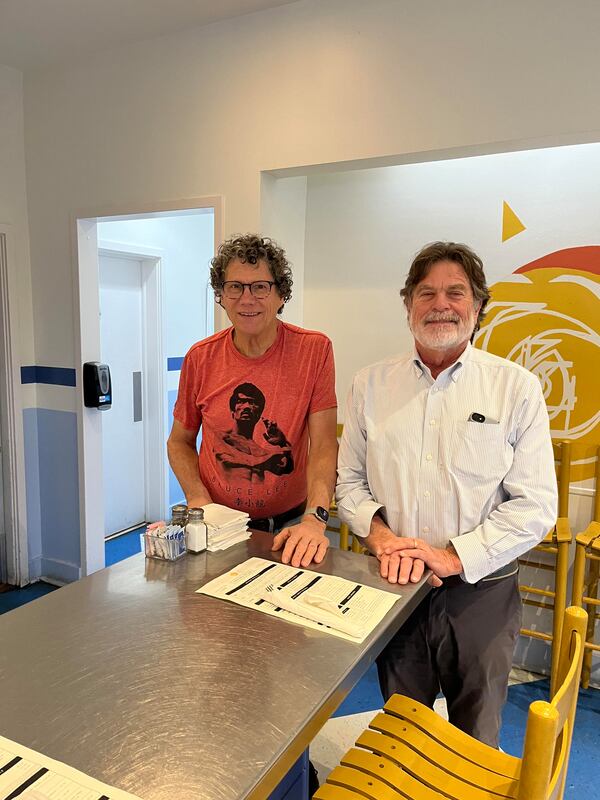 Taqueria del Sol owner Mike Klank (right) first knew bartender Bill Wood (left) as a customer at Manuel's Tavern. Courtesy of Taqueria del Sol