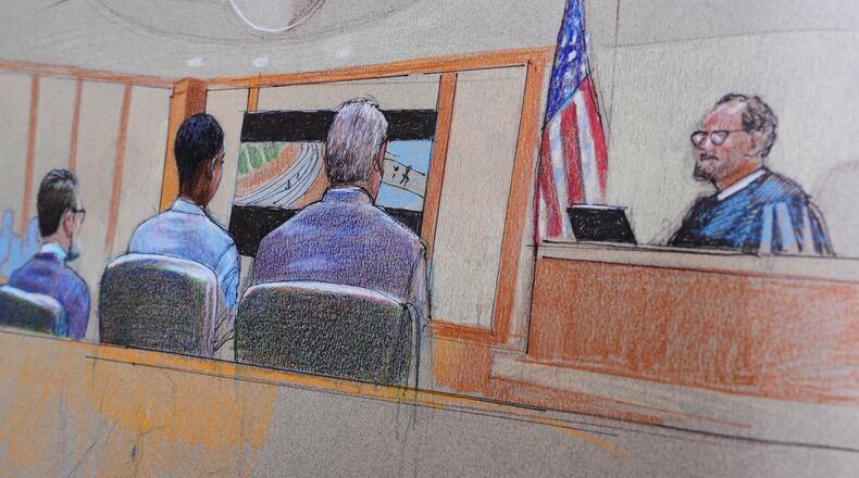 A courtroom sketch, provided by Pat Lopez shows Karmelo Anthony, center, at the defense table, the jury on the left and the presiding judge on the right, on Thursday, June 4, 2026, in McKinney, Texas, during the trial of a teen accused of fatally stabbing another during a track meet in suburban Dallas last year. (Pat Lopez via AP)