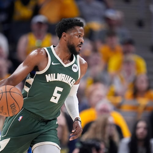 FILE - Milwaukee Bucks' Malik Beasley dribbles during the first half of Game 4 of the first round NBA playoff basketball series against the Indiana Pacers, April 28, 2024, in Indianapolis. (AP Photo/Michael Conroy, file)