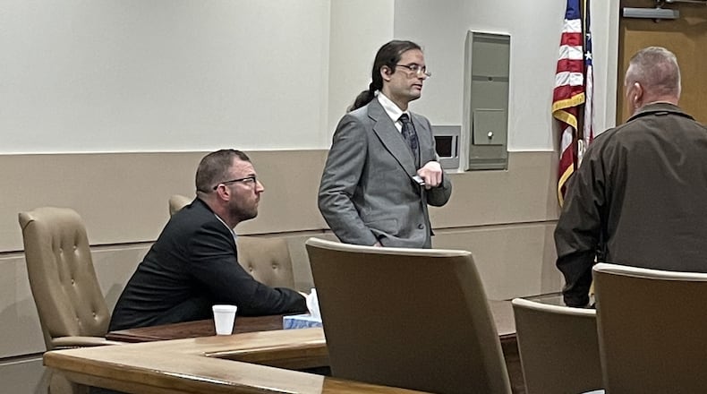 Neo-Nazi activist Michael Weaver, left, and attorney Justin Showalter, center, at a hearing in the Bartow County Courthouse in February 2023. In an opinion this month, the Georgia Court of Appeals refused to overturn a ruling dismissing his libel lawsuit, which required him to pay $20,000 in attorney fees.