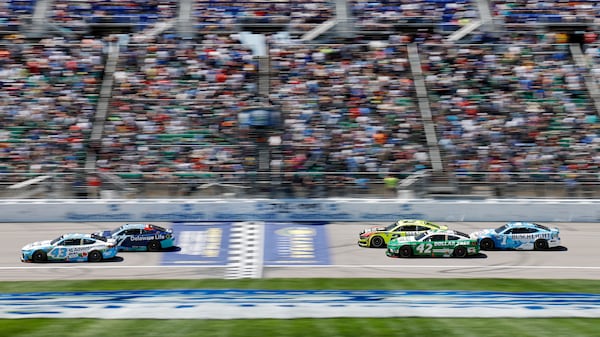 Drivers head down the front straightaway during a NASCAR Cup Series auto race at Kansas Speedway in Kansas City, Kan., Sunday, May 11, 2025. (AP Photo/Colin E. Braley)