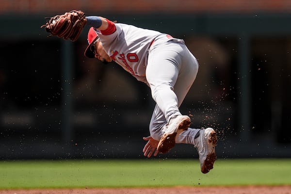 St. Louis Cardinals' Masyn Winn makes the tag on Atlanta Braves' Nick Allen in the x inning of a baseball game, Wednesday, April 23, 2025, in Atlanta. (AP Photo/Mike Stewart)