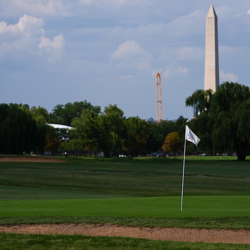 The Washington Monument is seen beyond the East Potomac Park Golf Course, Tuesday, Sept. 1, 2026, in Washington. (AP Photo/Julia Demaree Nikhinson)