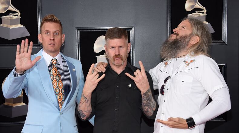Brann Dailor, from left, Bill Kelliher and Troy Sanders of Mastodon arrive at the 60th annual Grammy Awards at Madison Square Garden on Sunday, Jan. 28, 2018, in New York. (Photo by Evan Agostini/Invision/AP)