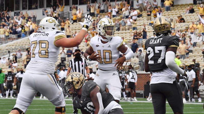 September 19, 2020 Atlanta - Georgia Tech's quarterback Jeff Sims (10) celebrates after he scored a touchdown during the first half of an NCAA college football game at Georgia Tech's Bobby Dodd Stadium in Atlanta on Saturday, September 19, 2020. (Hyosub Shin / Hyosub.Shin@ajc.com)