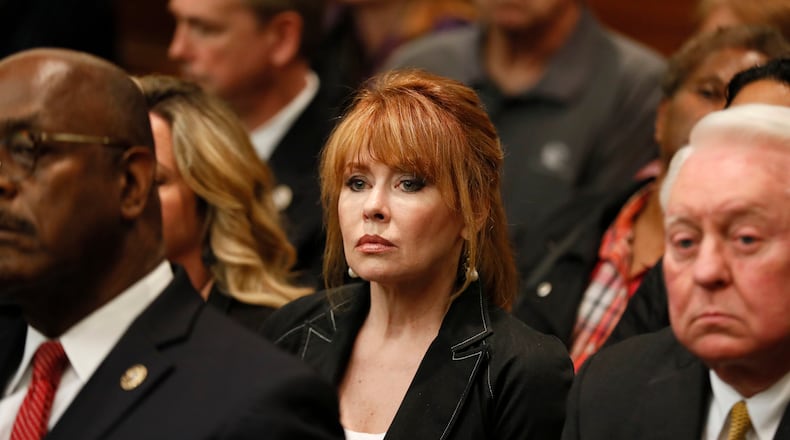 4/23/18 - Atlanta -Dani Jo Carter listens to the verdict. The jury found Tex McIver guilty on four of five charges on their fifth day of deliberations today at the Tex McIver murder trial at the Fulton County Courthouse. Bob Andres bandres@ajc.com