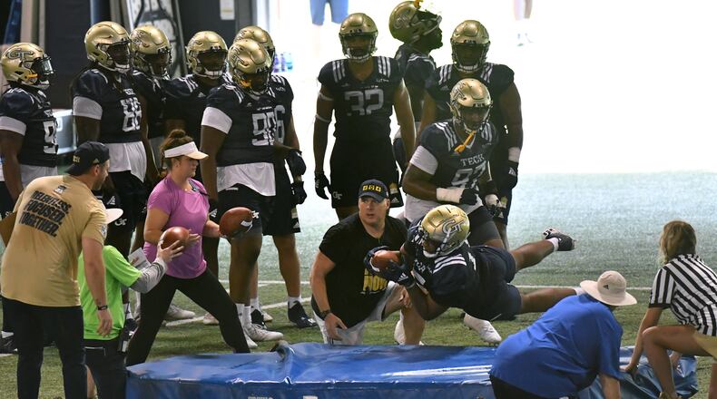 Georgia Tech coach Geoff Collins instructs during a football practice at Rose Bowl Field on Georgia Tech campus on Friday, August 6, 2021. (Hyosub Shin / Hyosub.Shin@ajc.com)