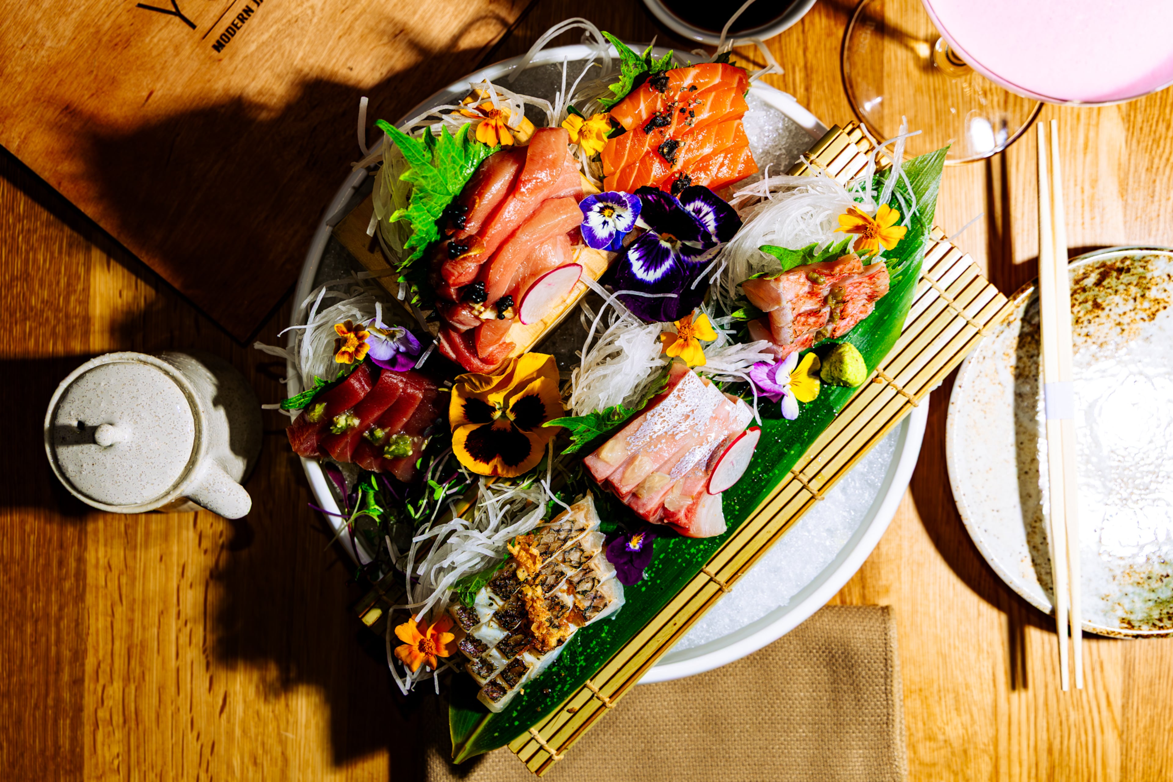 The food at Yuji has a wide range of prices, from the $10 carrot ginger salad (which is big enough to be an entree if you choose to add a protein) to the 10-ounce umami wagyu steak at $300. (Courtesy of Xzavier Nanthavongsa/Yuji Modern Japanese)