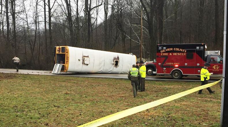 After a bus rolled over Monday, 16 middle school students were taken to two area hospitals.
