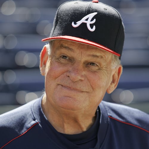 FILE - Atlanta Braves manager Bobby Cox smiles while talking to reporters during team practice at Turner Field in Atlanta, Oct. 4, 2005. (AP Photo/Ed Reinke, File)