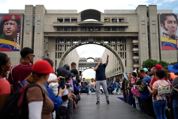 Nicolas Maduro Guerra, son of Venezuelan President Nicolas Maduro, campaigns for National Assembly lawmaker to represent Caracas, with the United Socialist Party of Venezuela (PSUV), in Caracas, Venezuela, Friday, May 9, 2025. (AP Photo/Ariana Cubillos)