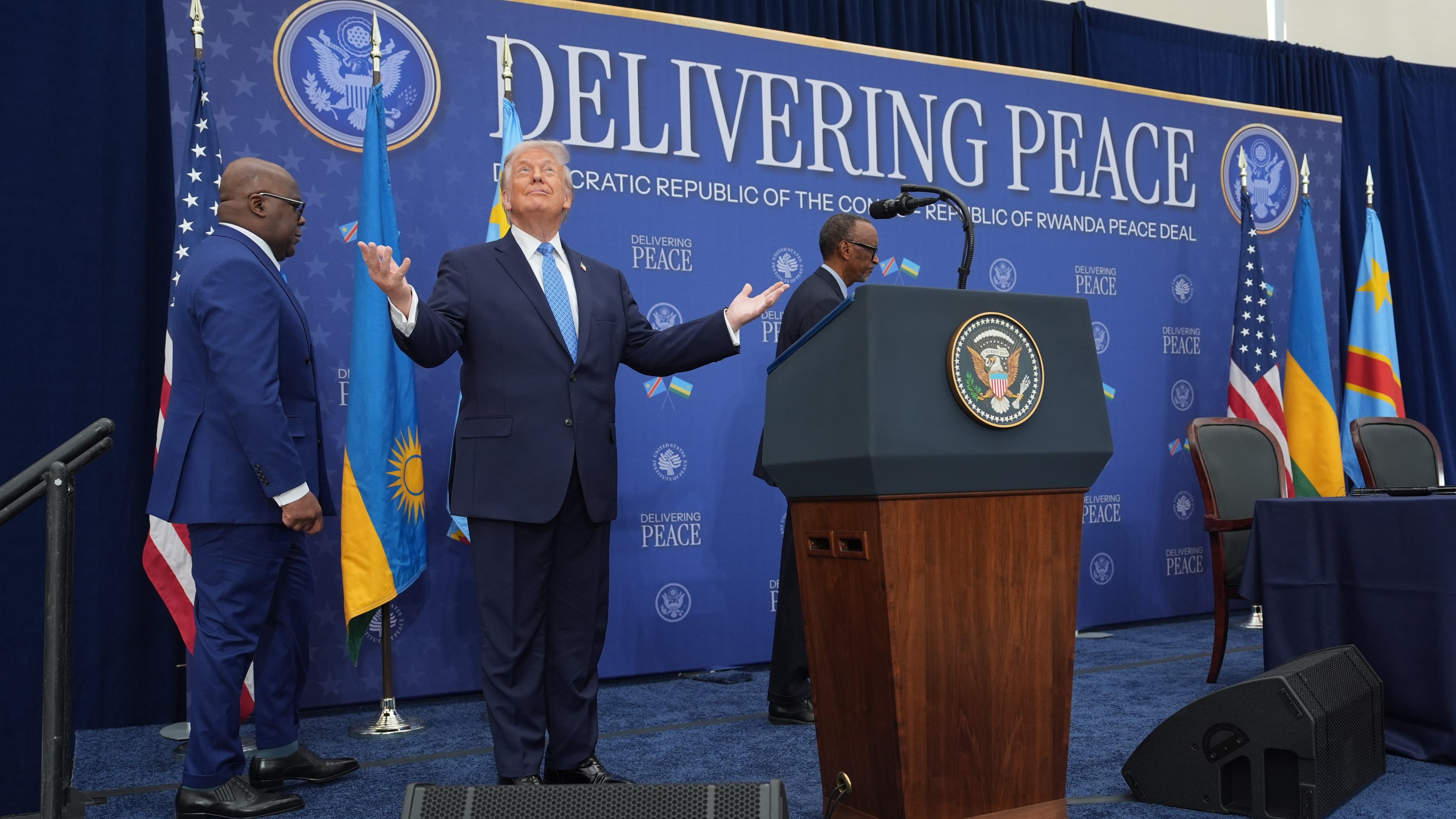 President Donald Trump arrives for a signing ceremony with Rwanda's President Paul Kagame and Democratic Republic of Congo President Felix-Antoine Tshisekedi at the U.S. Institute of Peace, Thursday, Dec. 4, 2025, in Washington. (AP Photo/Evan Vucci)