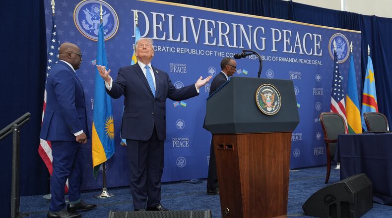 President Donald Trump arrives for a signing ceremony with Rwanda's President Paul Kagame and Democratic Republic of Congo President Felix-Antoine Tshisekedi at the U.S. Institute of Peace, Thursday, Dec. 4, 2025, in Washington. (AP Photo/Evan Vucci)
