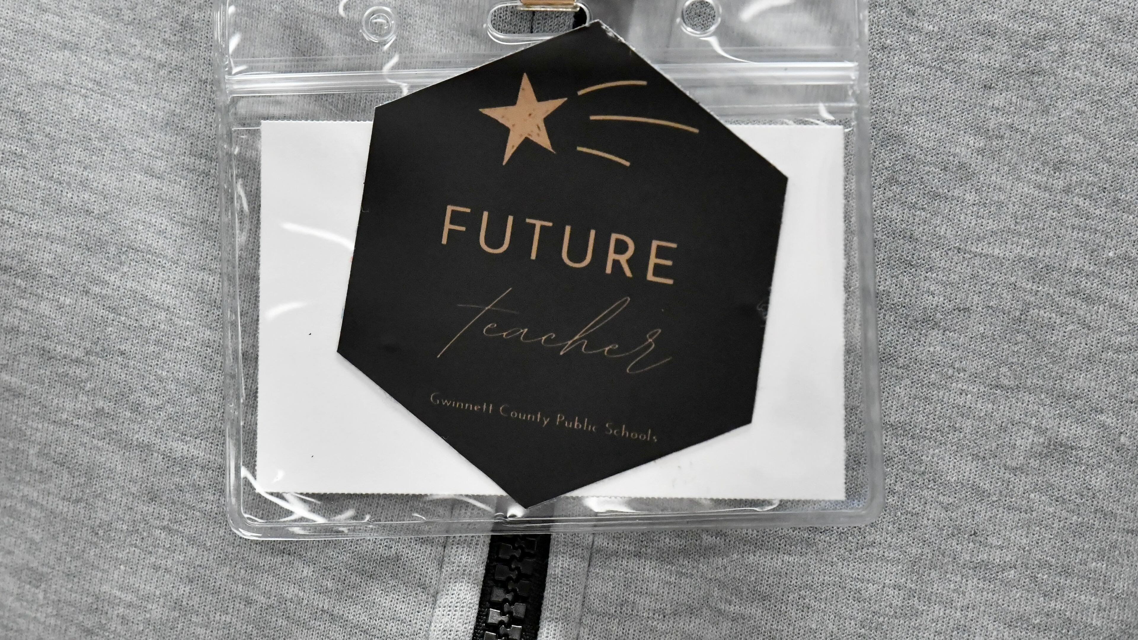 A “Future Teacher” name tag identifies a senior student who is also a teacher aide to fellow students during a precalculus class at South Gwinnett High School, Wednesday, September 13, 2023, in Snellville. Students who are interested in teaching get a deeper exposure to the career while they are still in high school. (Hyosub Shin/ajc)