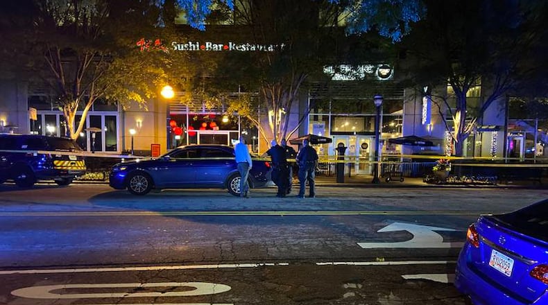 Police investigated after shots were fired Thursday night inside RA Sushi on Peachtree Street.