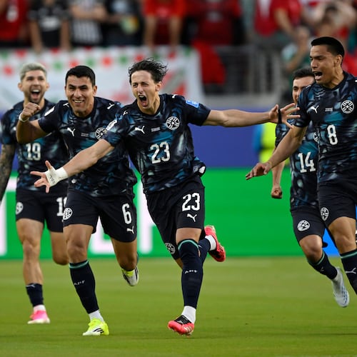 Paraguay's Matias Galarza (23) celebrates with Junior Alonso (6) and Diego Gomez (8) after scoring their opening goal during the World Cup Group D soccer match between Turkey and Paraguay in Santa Clara, Calif., near San Francisco, Friday, June 19, 2026. (AP Photo/Eakin Howard)