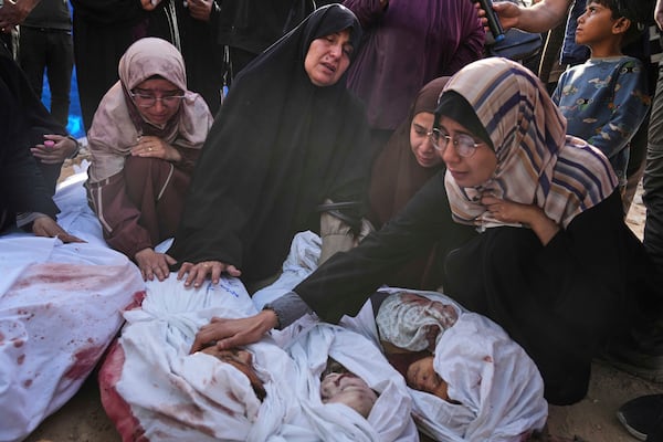 Palestinians mourn children from their families who were killed in Israeli airstrikes in Jabalia, in the northern Gaza Strip, on Wednesday, May 14, 2025. According to local hospitals, the strikes killed 48 people, including 22 children. (AP Photo/Jehad Alshrafi)