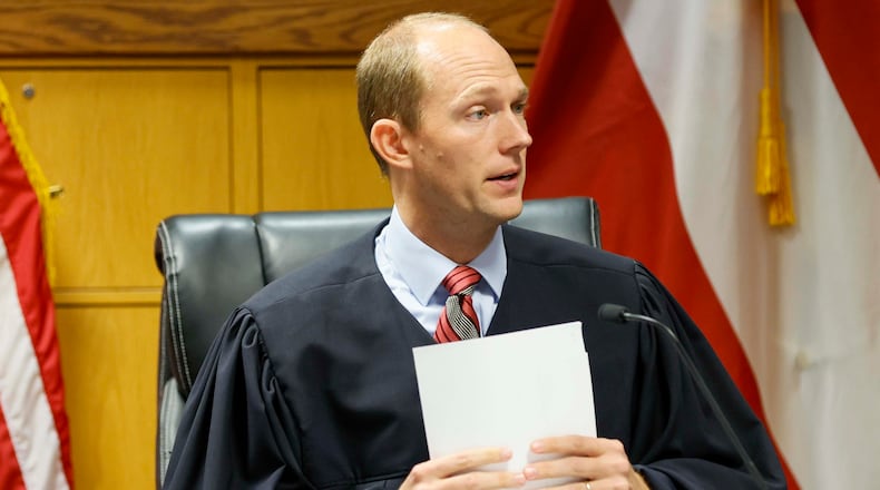 Fulton County Superior Court Judge Scott McAfee presides over the sentencing hearing of former APD officer Koby Minor, who killed Rginald Folks while operating a Lyft vehicle in May 2024. Tuesday, October 7, 2025. (Miguel Martinez/ AJC)
