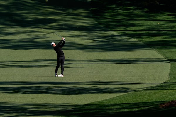 Rory McIlroy, of Northern Ireland, hits from the 10th fairway during a practice round at the Masters golf tournament, Tuesday, April 8, 2025, in Augusta, Ga. (AP Photo/Matt Slocum)
