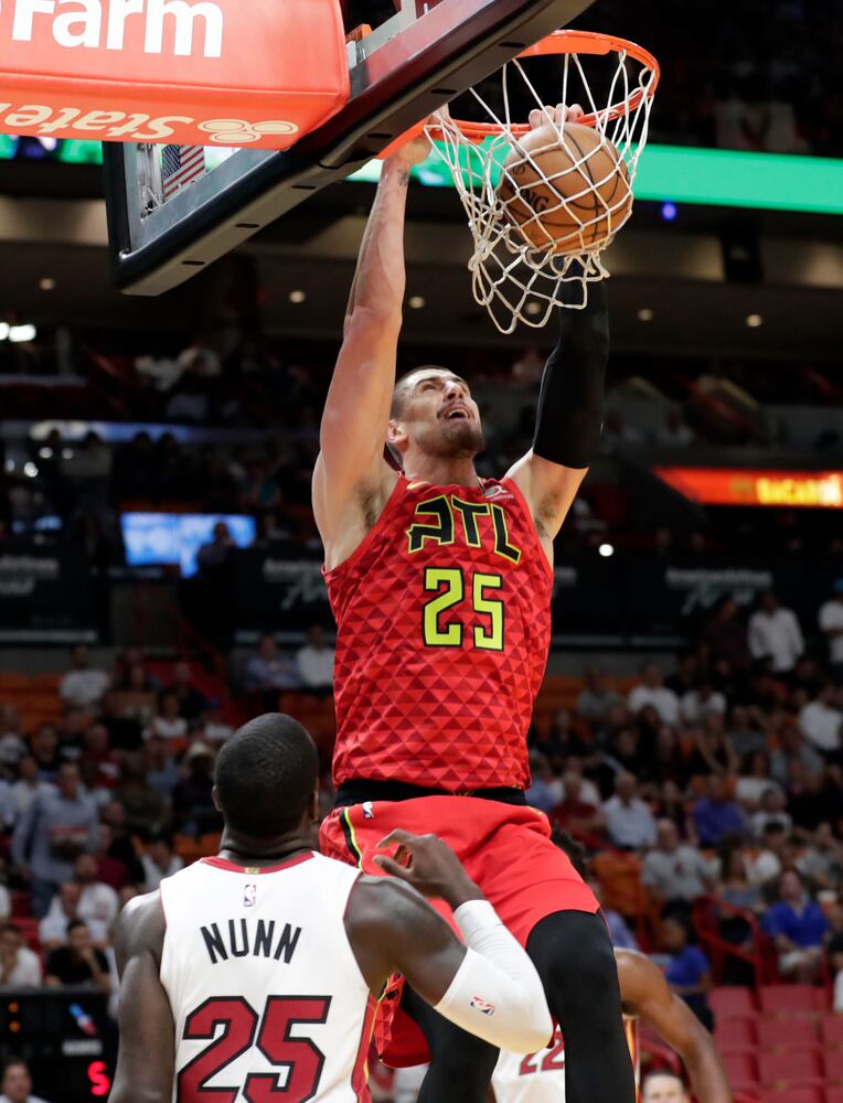 Photos: Hawks star Trae Young injures ankle