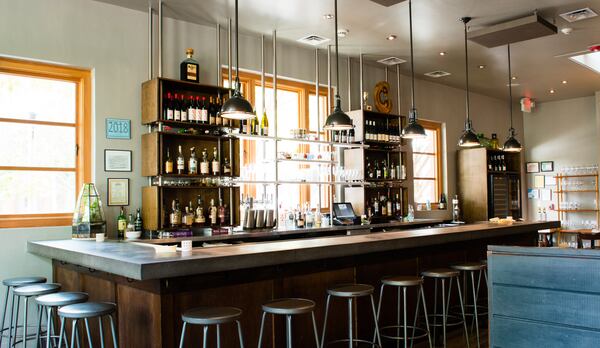  The bar at Cakes + Ale / CONTRIBUTED BY HENRI HOLLIS