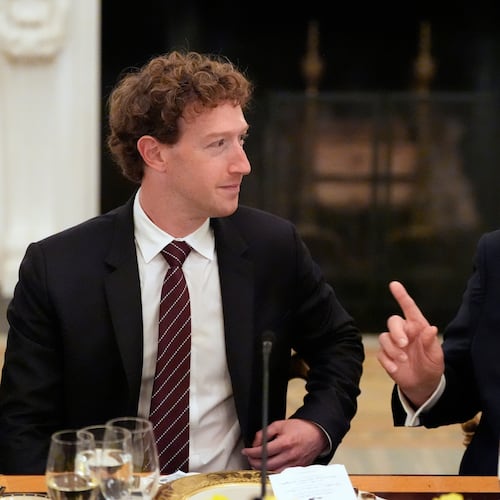 FILE - President Donald Trump speaks to Facebook CEO Mark Zuckerberg during a dinner in the State Dining Room of the White House, Sept. 4, 2025, in Washington. (AP Photo/Alex Brandon, File)