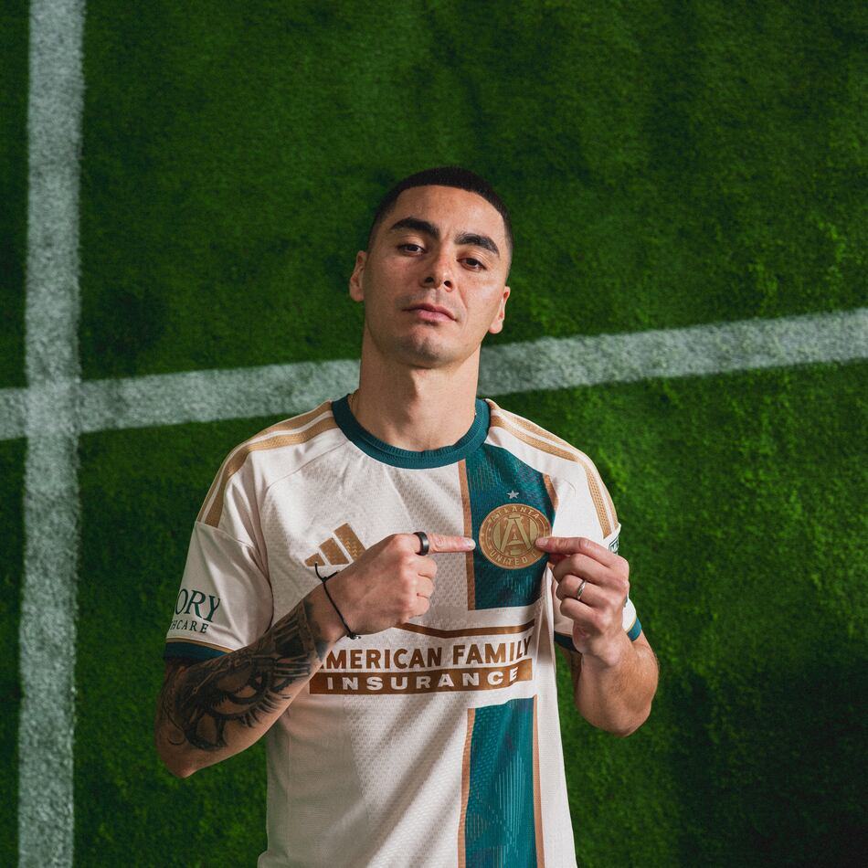 Atlanta United forward Miguel Almirón wears the club’s new “Spirit of ’96” kit. The team badge, placed on the left so it will be over the jersey wearer’s heart, is gold — similar to a 1996 Olympics medal. (Mitch Martin/Atlanta United)
