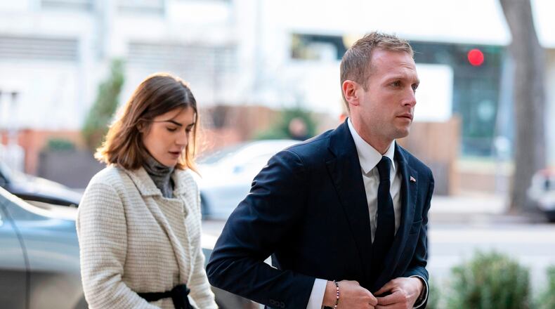 FILE - Rep.-elect Max Miller, R-Ohio, arrives for new member orientation check-in and program registration with Emily Moreno in Washington, Nov. 13, 2022. (AP Photo/Amanda Andrade-Rhoades, File)