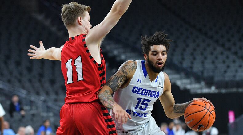 LAS VEGAS, NV - NOVEMBER 20: D'Marcus Simonds #15 of the Georgia State Panthers drives against Jack Perry #11 of the Eastern Washington Eagles during day one of the Main Event basketball tournament at T-Mobile Arena on November 20, 2017 in Las Vegas, Nevada. (Photo by Sam Wasson/Getty Images)