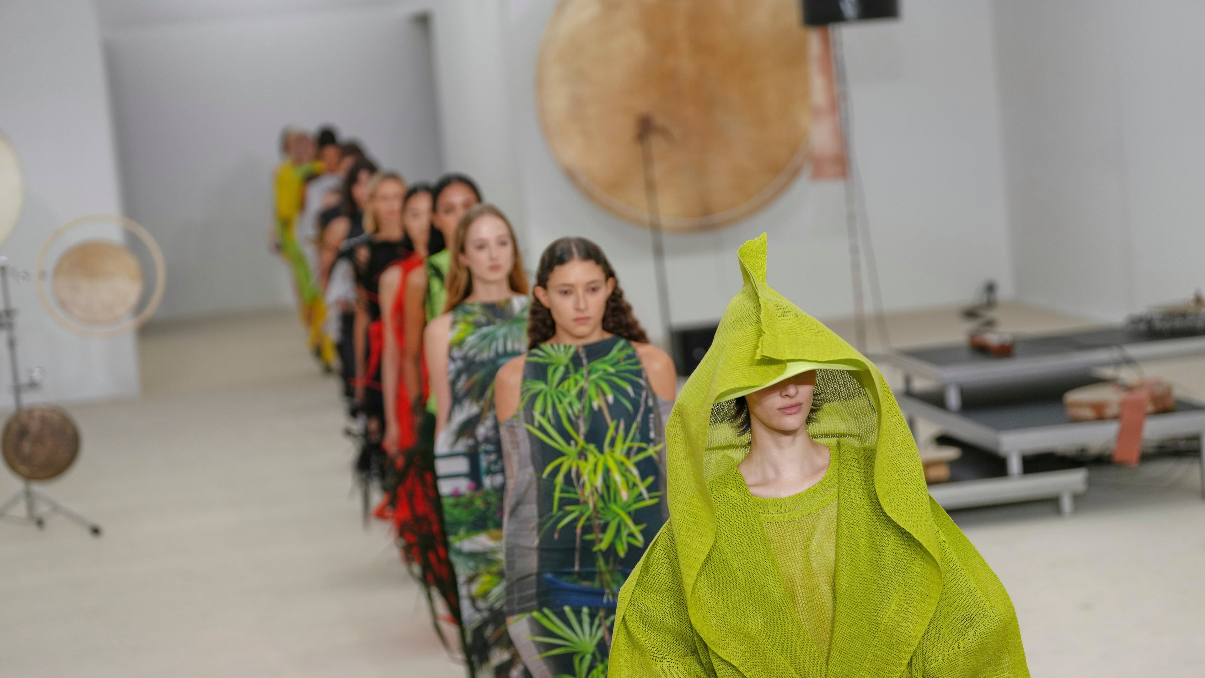 Models wear creations as part of the Issey Miyake Spring/Summer 2026 collection presented in Paris, Friday, Oct. 3, 2025. (AP Photo/Aurelien Morissard)