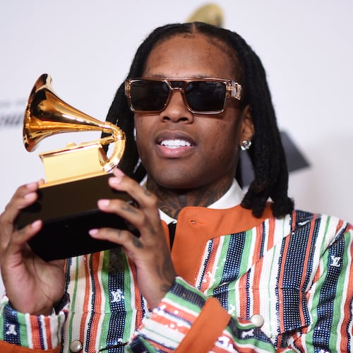 FILE - Lil Durk poses for a photo in the press room with the award for best melodic rap performance for "All My Life" by Lil Durk featuring J. Cole during the 66th annual Grammy Awards, Feb. 4, 2024, in Los Angeles. (Photo by Richard Shotwell/Invision/AP, File)