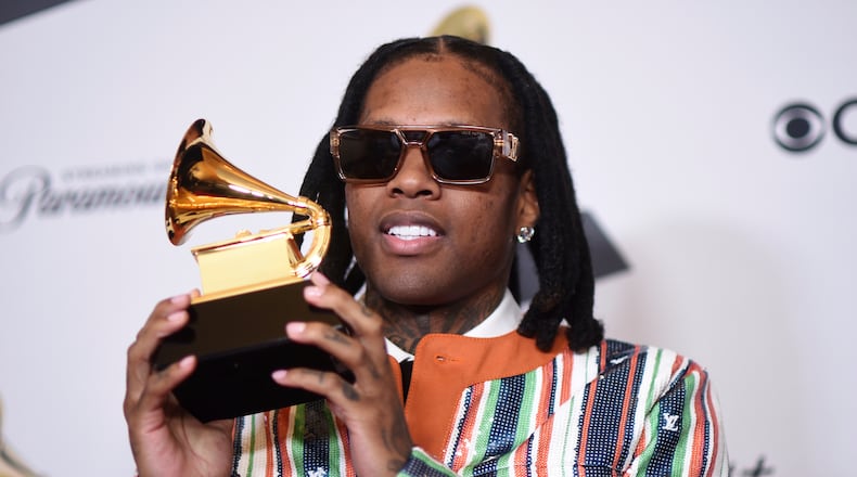 FILE - Lil Durk poses for a photo in the press room with the award for best melodic rap performance for "All My Life" by Lil Durk featuring J. Cole during the 66th annual Grammy Awards, Feb. 4, 2024, in Los Angeles. (Photo by Richard Shotwell/Invision/AP, File)