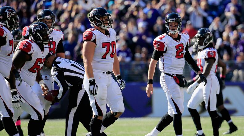 BALTIMORE, MD - OCTOBER 19: Quarterback Matt Ryan #2 of the Atlanta Falcons walks off the field after failing to convert on 4th down in the second half of a game against the Baltimore Ravens at M&T Bank Stadium on October 19, 2014 in Baltimore, Maryland. (Photo by Rob Carr/Getty Images)