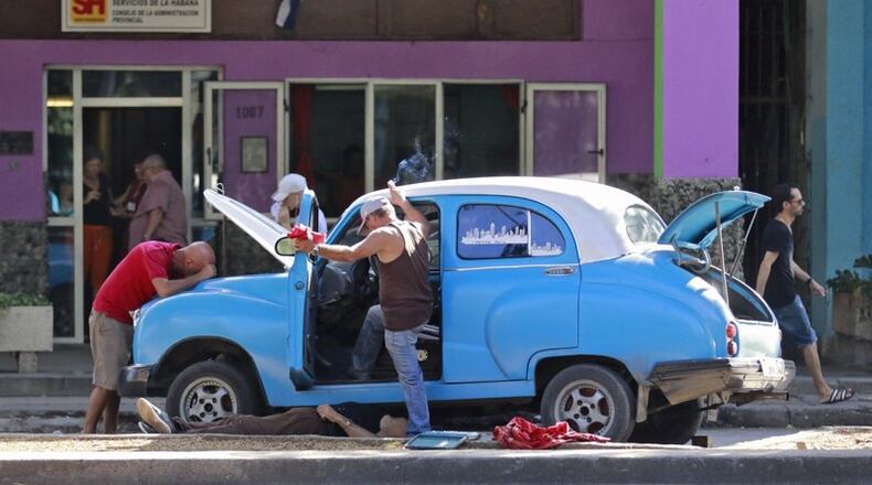 Vintage taxis are a popular draw in Havana, but they are not trouble free, and it is a common site to see repair work taking place on the side of the road. Delta launched its first scheduled airline flights to Cuba on Dec. 1, a key milestone in the U.S. opening to Cuba. BOB ANDRES /BANDRES@AJC.COM