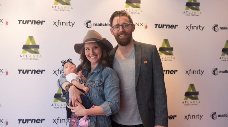 Matt Torney, a Belfast native and associate artistic director in Washington, D.C.'s  Studio Theatre, will be the new artistic director at downtown Atlanta's Theatrical Outfit. He is seen here with wife Amber McGinnis and their new daughter, Isla May Torney. CONTRIBUTED: MATT TORNEY