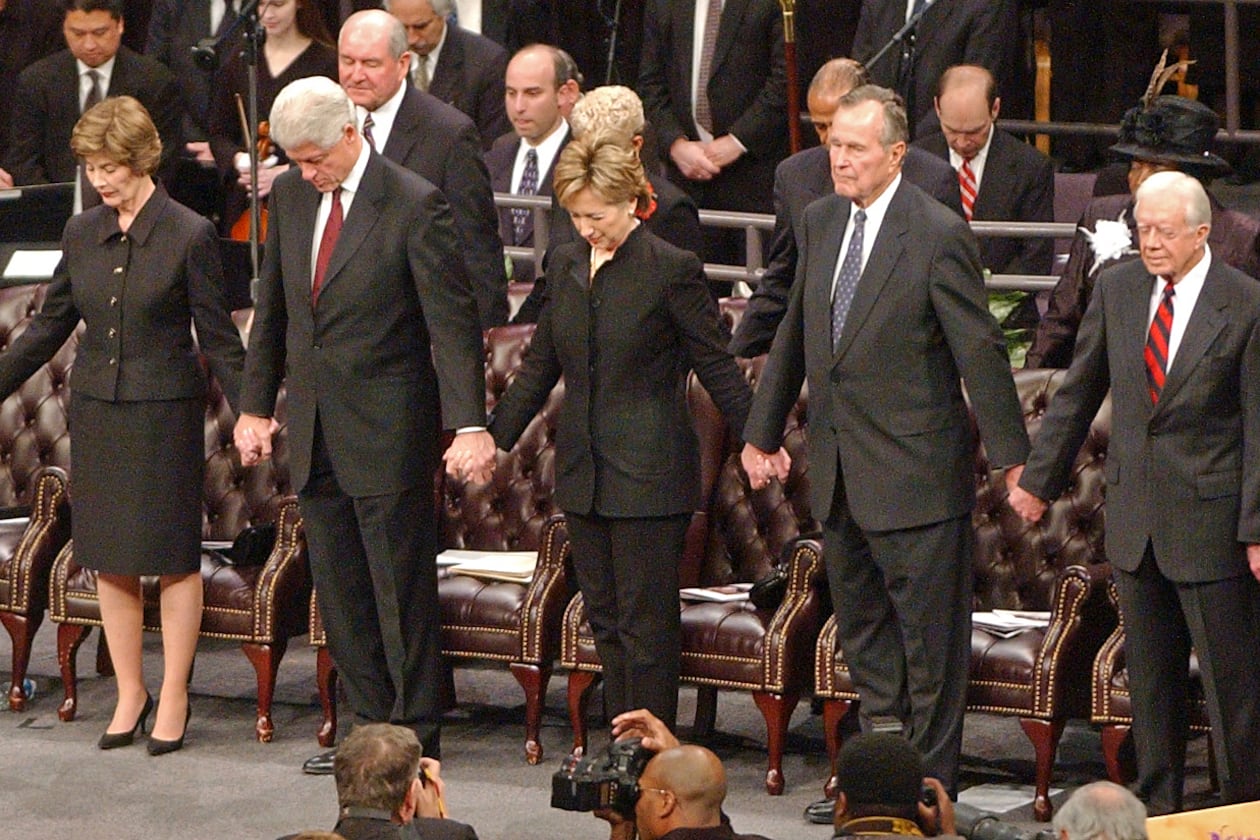 Four U.S. presidents and a U.S. senator attended the funeral service for Coretta Scott King, wife of Dr. Martin Luther King, Jr., at the New Birth Missionary Baptist Church on Feb. 6, 2006. From left President George W. Bush, First Lady Laura Bush, Bill Clinton, Sen. Hillary Clinton, George H.W. Bush, Jimmy Carter and his wife, Rosalynn.