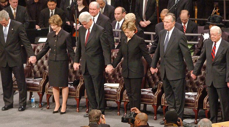 Four U.S. presidents and a U.S. senator attended the funeral service for Coretta Scott King, wife of Dr. Martin Luther King, Jr., at the New Birth Missionary Baptist Church on Feb. 6, 2006. From left President George W. Bush, First Lady Laura Bush, Bill Clinton, Sen. Hillary Clinton, George H.W. Bush, Jimmy Carter and his wife, Rosalynn.
