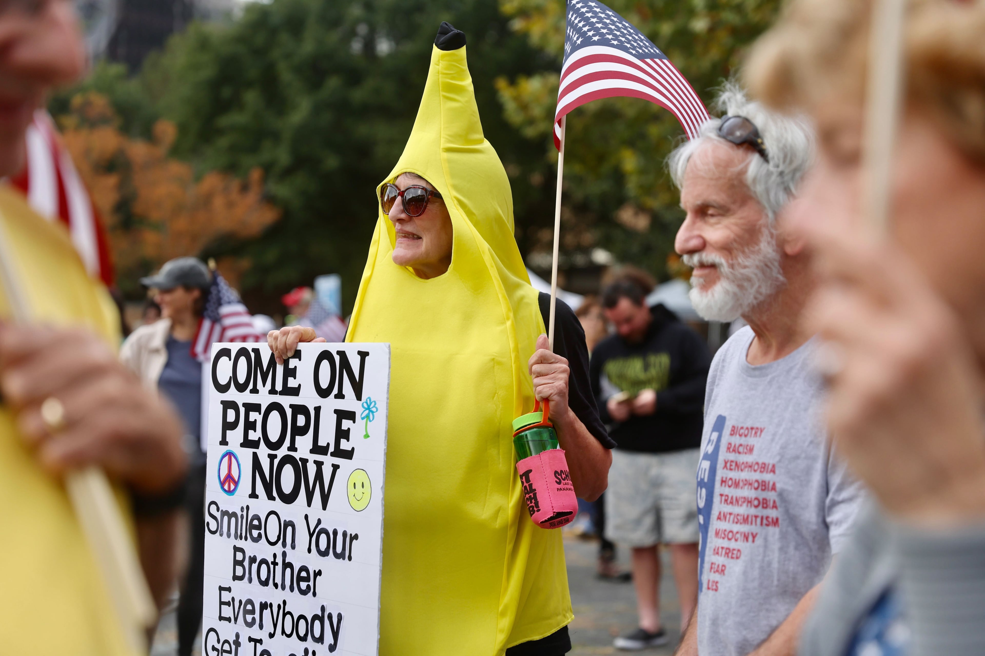 Miriam McCann dressed up as a banana to show that demonstrators intend on remaining peaceful. (Abbey Cutrer / AJC)