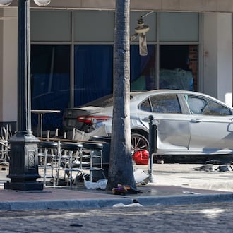 A car that crashed into a local business is shown on Saturday, Nov. 8, 2025, in Tampa, Fla. (Jefferee Woo/Tampa Bay Times via AP)