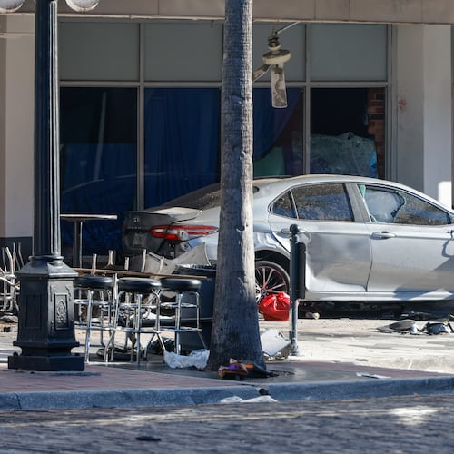 A car that crashed into a local business is shown on Saturday, Nov. 8, 2025, in Tampa, Fla. (Jefferee Woo/Tampa Bay Times via AP)