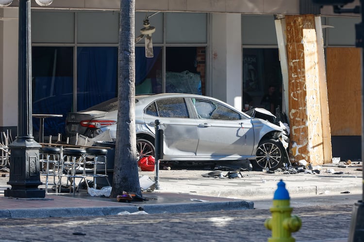 A car that crashed into a local business is shown on Saturday, Nov. 8, 2025, in Tampa, Fla. (Jefferee Woo/Tampa Bay Times via AP)