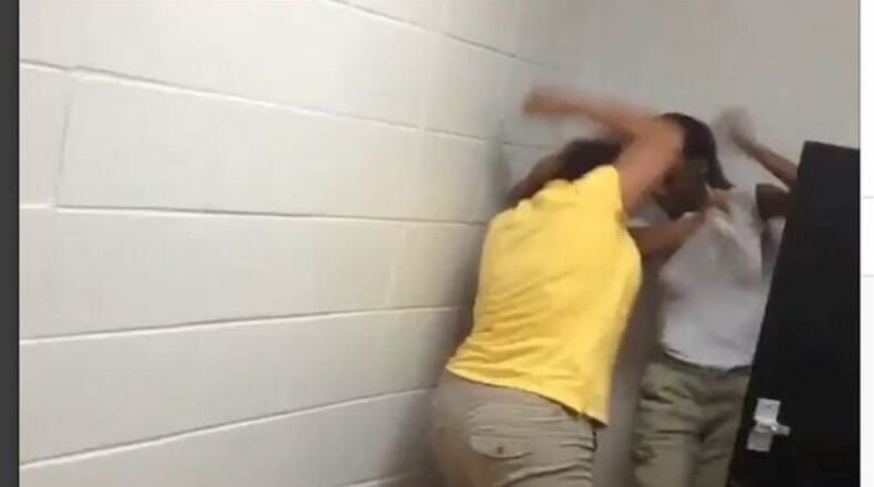 In school fights such as this one shared on social media, officials must consider a student's claim of self-defense under Georgia law, according to a new ruling by the state Supreme Court.