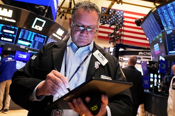 Trader Edward Curran works on the floor of the New York Stock Exchange, Monday, May 5, 2025. (AP Photo/Richard Drew)