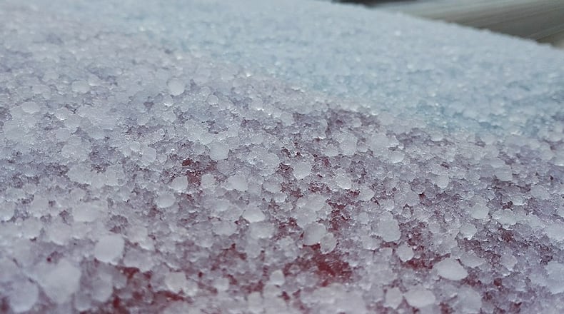 The soft, small pellets that are formed when supercooled water droplets freeze onto a snow crystal are known as graupel.