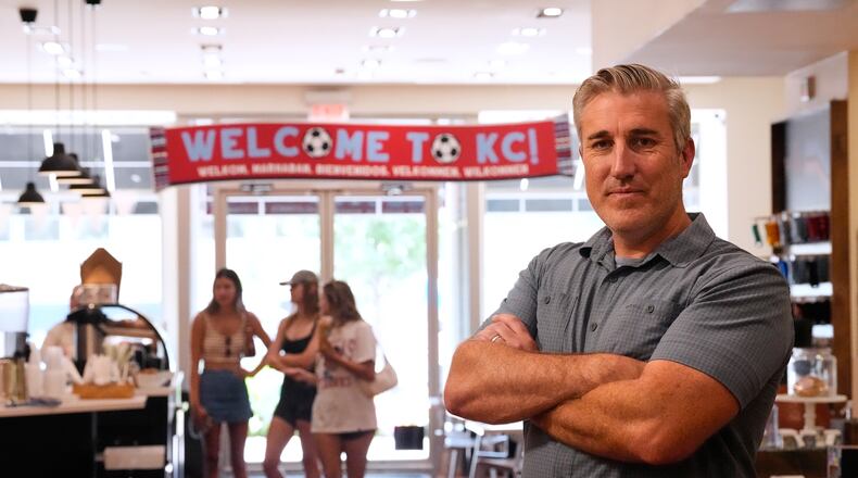 Made in Kansas City owner Keith Bradley has seen an influx of customers for his business as soccer fans have flocked to the city which is hosting FIFA World Cup soccer games Monday, June 29, 2026, in Kansas City, Kan. (AP Photo/Charlie Riedel)
