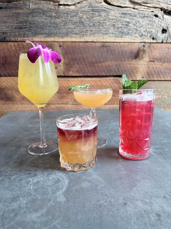 The Ashford on Dresden has a lengthy menu of zero-proof options, including Tiny Bubbles (left) made with pineapple cordial and nonalcoholic prosecco. (Courtesy of the Ashford)