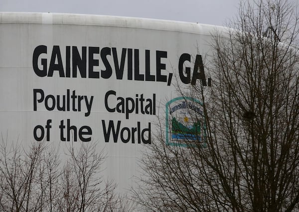 A water tank touts Gainesville as the poultry capital of the world on Monday, Feb 16, 2015, in Gainesville. Curtis Compton / ccompton@ajc.com