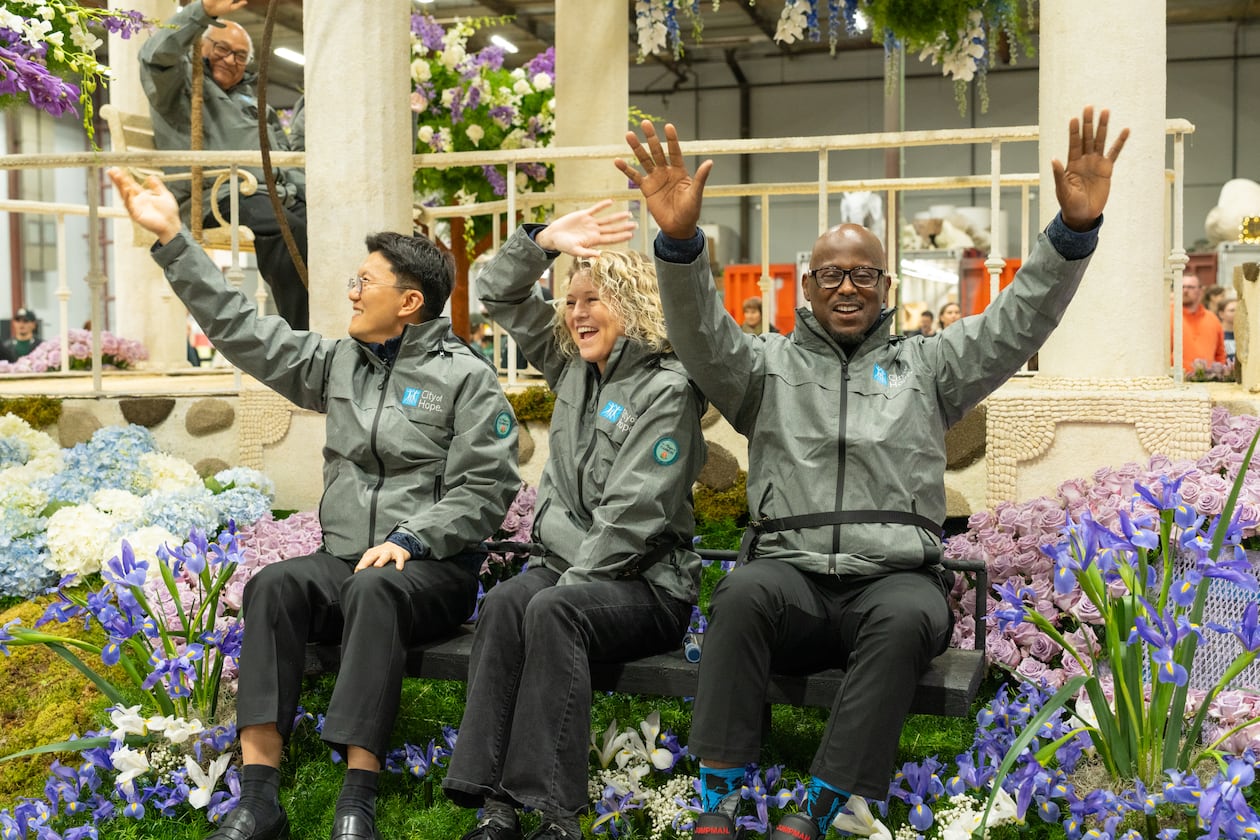 City of Hope chose Tyler Blue (right) to represent the cancer center on its Rose Parade float on New Year's Day. Also pictured, from left, are Dr. Beomjune Kim, one of Tyler's doctors from City of Hope Atlanta, and Jodi Cruz, a patient from City of Hope Duarte in Los Angeles. (City of Hope Cancer Center Atlanta)