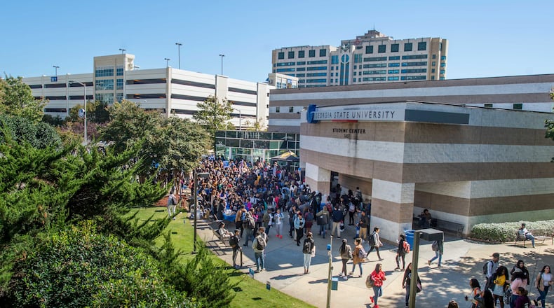 Georgia State University students walk about a portion of its Atlanta campus.