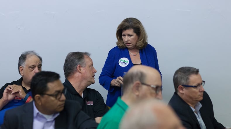 U.S. Rep. Karen Handel greets guests during a breakfast meet and greet at Cobb County GOP headquarters in Marietta. BRANDEN CAMP/SPECIAL